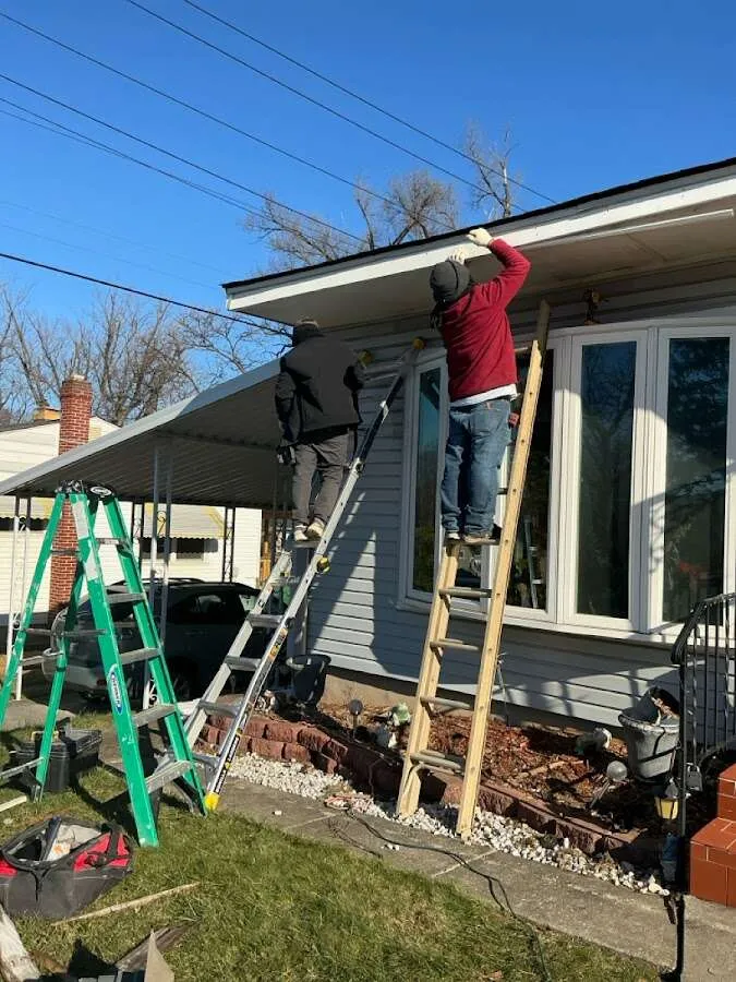 Restoration crew performing exterior repair in Denton